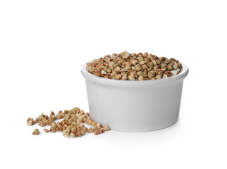 Organic green buckwheat in bowl isolated on white
