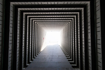 Fototapeta premium Looking up view of a square building
