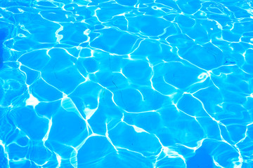 Surface of blue swimming pool