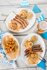 October fest concept - sausages of different types, beer
