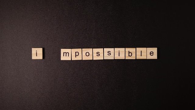 Hand changing "Impossible" to "I'm possible"