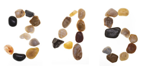 3 4 5 (alphabet) hand-made numbers and letters with stones (boulders, rolling stones). Typography Collection. Isolated on white background