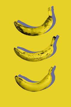 Fototapeta Photography minimal art collage of ugly ripe fruit bananas on yellow color background in trendy pop-art style.Top view flat lay isometric pattern.Modern design.Vertical orientation