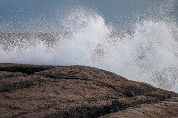 Granite rock taking a hit from stormy waters
