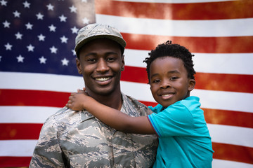 Portrait of soldier with son