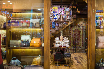 Fashion store in Grand Bazaar in Istanbul, Turkey. souvenir shop with jewelry, textile, carpet, leather, gift, spice and canvas bags