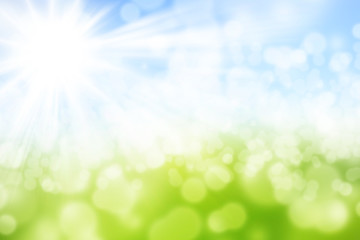 Green and blue blurred summer background with shining sun and with Bokeh