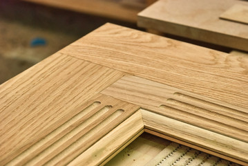 Joinery. Details wooden furniture production. Classic door element