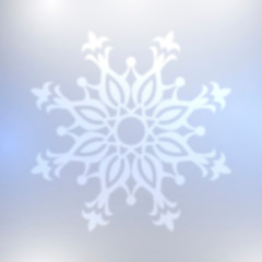 Abstract blue snowflake with blurred effect.