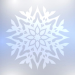 Abstract blue snowflake with blurred effect.