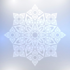 Abstract blue snowflake with blurred effect.