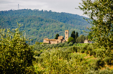 View of Ss. Mary and Leonard parsih church in Artimino with typical tuscan landscape