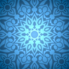 Abstract blue snowflake with blurred effect.