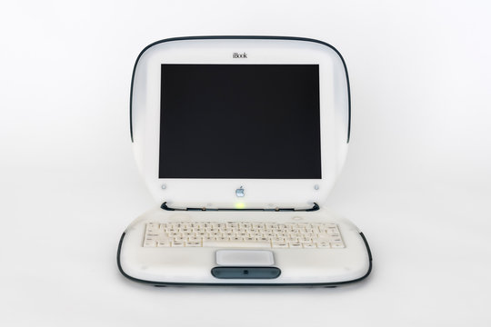 Illustrative editorial photo of old Apple clamshell style iBook laptop computer with white background on November 6, 2019 in Los Angeles, California, USA. 