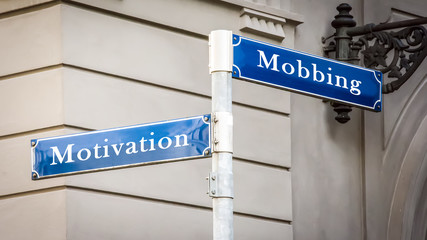 Obraz premium Street Sign to Motivation versus Mobbing