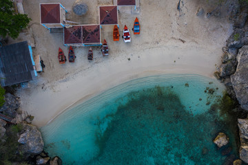 Aerial view of coast of Curaçao in the Caribbean Sea with turquoise water, cliff and beach