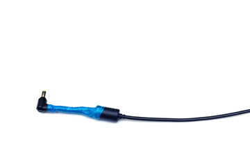 Obraz premium charging cable wrapped in blue electrical tape