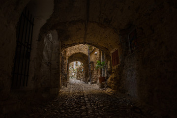 Obraz premium The Italian city of ghost or the city of artists Bussano Viecha. Golden autumn, yellow leaves, blue sky and sun!