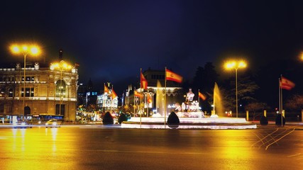 Fototapeta na wymiar Lights of the night Madrid, Spain. Plaza de Cibeles.