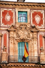Old colorful Episcopal Palace facade in Murcia