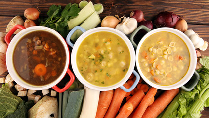 Set of soups from worldwide cuisines, healthy food. Broth with noodles, beef soup and broth with...