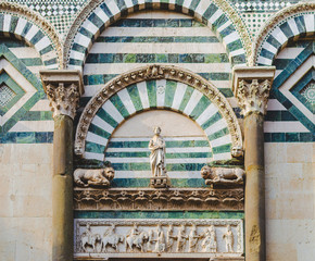 Detail of beautiful Sant'Anrea church portal in Pistoia Tuscany Italy