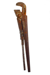 Rusty old used adjustable spanner on a white background
