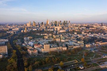 Warsaw, Poland. City landscape at sunrise. Aerial view of the river and the city with skyscrapers and buildings in the early morning.