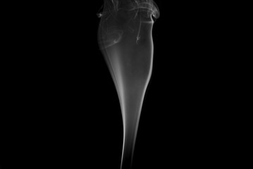 Movement of white smoke isolated on black background.Abstract shape and curve of smoke.