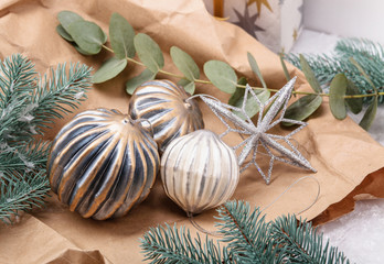 Christmas decoration with glass ornaments and fir branches