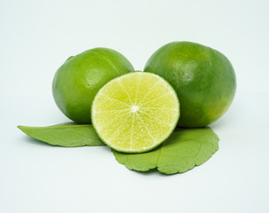 set of green fresh limes slice isolated on white background