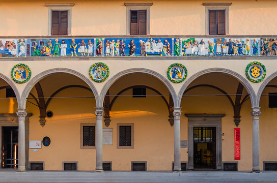 Pistoia old Ceppo hospital palace front facade with beautiful decoration and arches