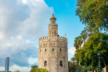 Fototapeta na wymiar SEVILLA, SPAIN - January 13, 2018: Tower of Gold (Torre del Oro) is a dodecagonal military watchtower in Seville, Spain