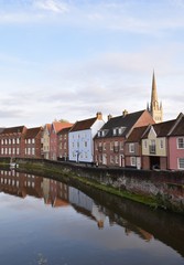 Views of Norwich Cathedral and River Wensum, on a sunny autumn day, from the Fye Bridge. Norfolk, England, UK.