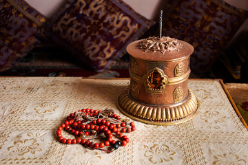 Tibet prayer wheel mantra mobile on carpet for tibetan people for respect praying buddha in house...