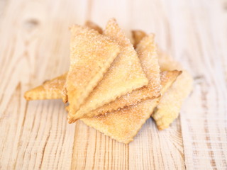shortbread biscuits with sugar on a wooden rustic table