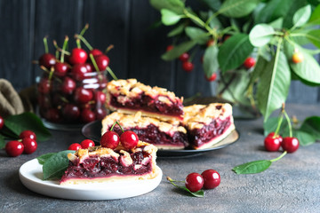 Delicious Homemade Cherry Pie with a Flaky Crust on dark background