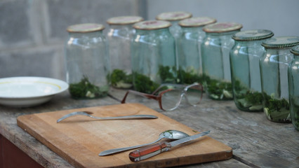 Photo of finished cans for preservation at home. Composition of empty cans for preservation at home background