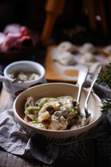 Pelmeni on wooden board.style rustic.