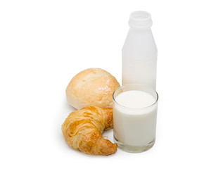 Pasteurized fresh milk in the glass with bread and plastic bottle on white background with clipping path.