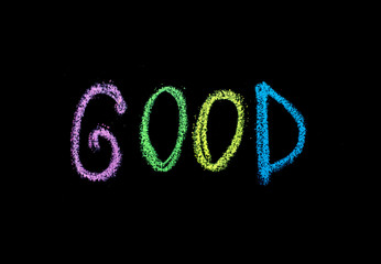 colored chalkdrawn word 'good' on blackboard