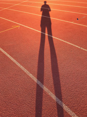 Human silhouette on the track.walking excercise