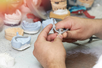 Closeup of a technician in a dental laboratory