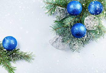 Christmas fir tree branch with decorations.