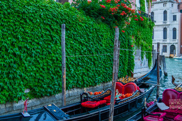 Canal with two gondolas in Venice, Italy. Architecture and landmarks. Postcard with Venice gondolas. Venice is a popular tourist destination of Europe.