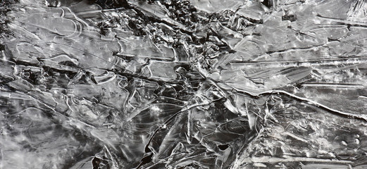 The morning frost has created from water an ice plate with a freakish pattern.