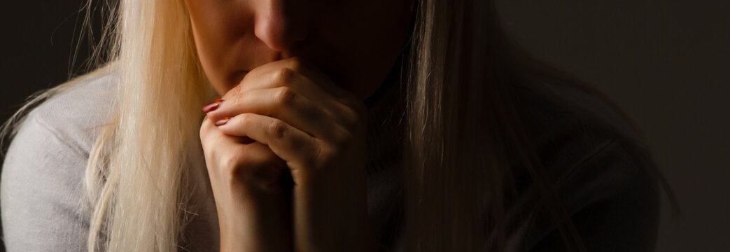 Religious Girl Praying On Color Background