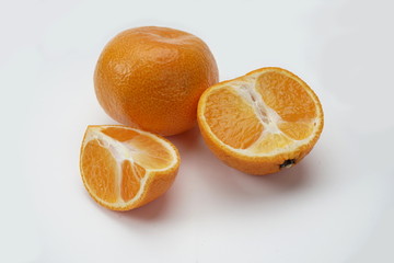 Tangerines isolated on a light background