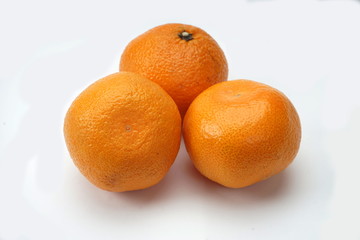 Tangerines isolated on a light background