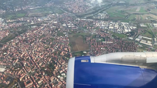  View from the airplane window on turin during the landing phase